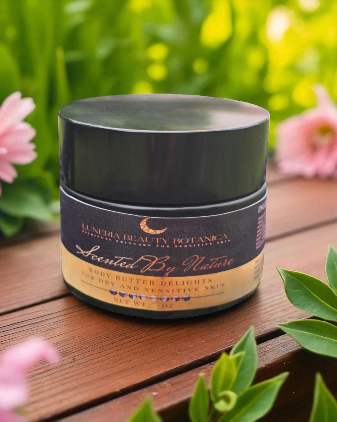 Jar of Luneria Beauty Botanica product on a wooden surface with flowers in the background