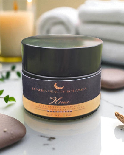 Cosmetic jar with 'Luneria Beauty Botanica' label on a white surface with blurred background