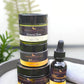 Stack of skincare products on a tray with a blurred background