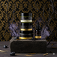 Stack of skincare products on a dark surface with decorative elements